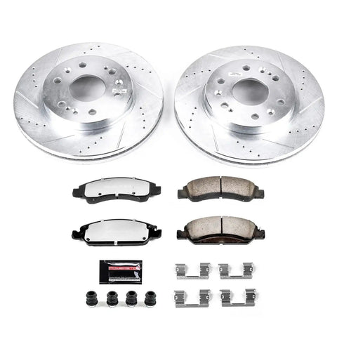 PowerStop front brake kit in front view with drilled/slotted rotors and carbon-ceramic pads.