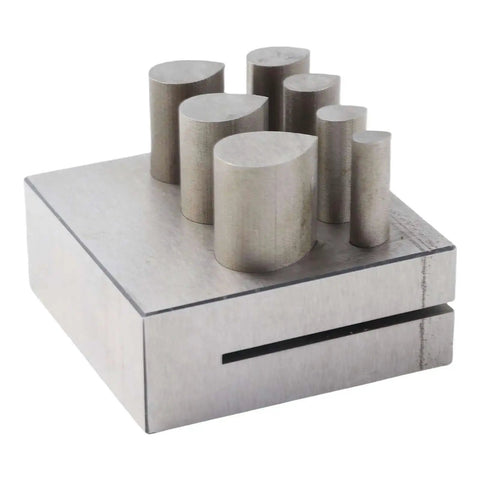 Drop Shaped Die Cutter Set With 7 Pieces In 45 Steel for jewelry making and crafting, showing flat bottom punches on a metal base.