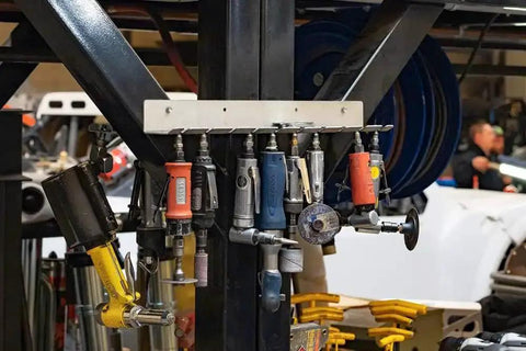 10 Slot Aluminum Air Pneumatic Tool Holder Tray For UTVs And Workshop Organization, displaying neatly secured pneumatic tools