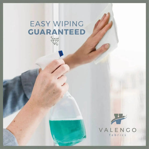 Person cleaning window with spray and Lint Free Cotton Cloth Rags For Staining Wood And Cast Iron, Painting, Dusting And Cleaning, Soft 100 Percent Jersey Knit Cotton, Streak Free, Scratch Safe, Reusable And Ultra Absorbent 17x17 Inch Rags Pack Of 14.