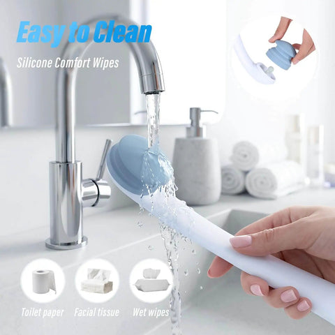 Butt Wiper Tool With Replaceable Head And 16.5 Inch Handle Locking Mushroom Head Toilet Aid being rinsed under faucet
