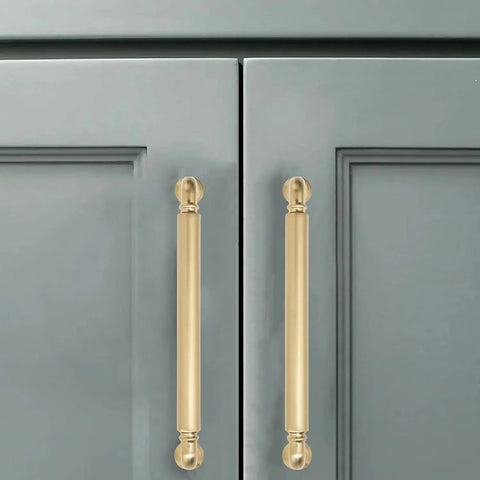 Champagne Bronze Solid Cabinet Pulls Set Of Ten, 5 Inch Center To Center Heavy Duty Cabinet Handles installed on gray cabinet doors