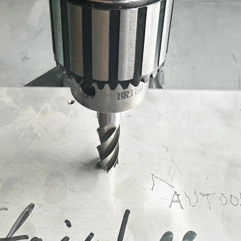 Close-up of a 4-flute end mill in action for milling metal, showcasing precision cutting tool.