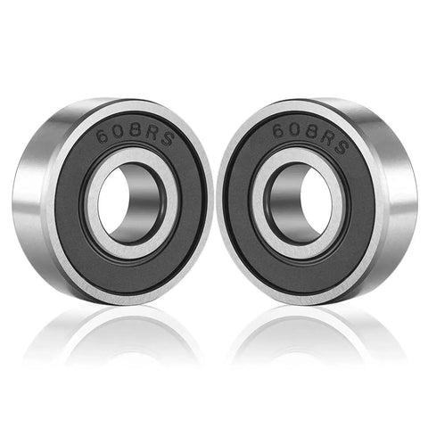 Close-up of two 10 Pack 608 2RS Ball Bearings Double Rubber Sealed for Skateboards, Inline Skates, and Scooters, showing seals and steel construction.