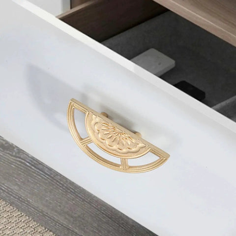 Two Pack Brushed Gold Zinc Alloy Cabinet Pulls Semi Circular Dresser Pulls installed on white drawer