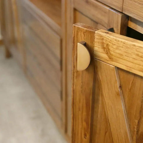 Champagne Bronze Zinc Alloy Cabinet Drawer Pull installed on a wooden cabinet door, offering a striped decorative design with solid construction.