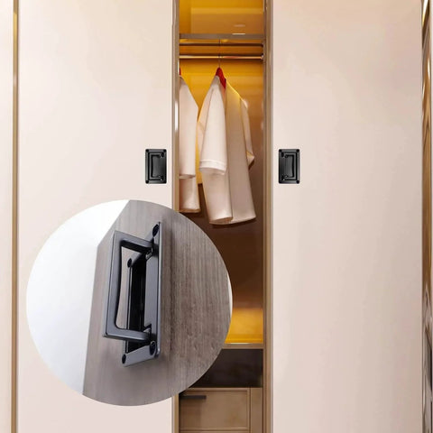 Black recessed flush pull handles for deck hatches installed on a beige wardrobe, close-up and front view. Two-piece zinc alloy set.