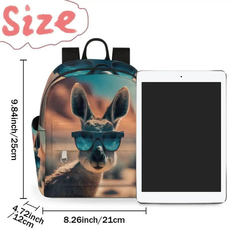Front view of a Mini Backpack Purse For Women With Adjustable Straps featuring a kangaroo with sunglasses design, next to a tablet for size comparison.