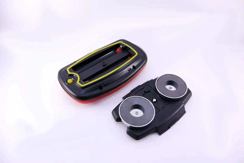 Underside view of Lite It Red LED Trailer Light With Magnetic Mount Battery Powered Wireless Tail Light For Trailers Ultra Low Profile Heavy Duty Magnets Two Modes Flash Or Steady, showing the magnetic mount and battery compartment.