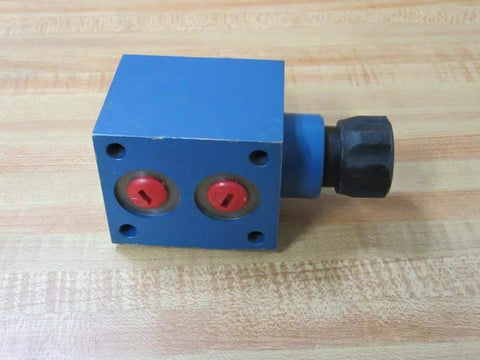 Bosch Rexroth R900978977 AF6EA40Z250V hydraulic valve with black push and turn button, side view showing NPT ports.