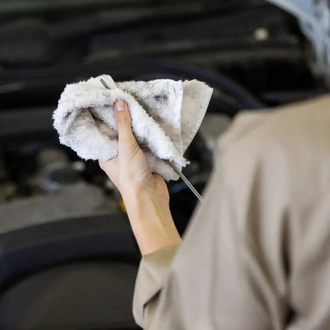 Person using Bar Mop Towels Value Pack Of 60, 14 By 17 Inches, Absorbent And Durable Multipurpose Cleaning Rags on car engine.