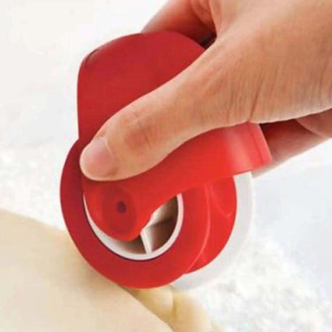 Pie Crust Cutter With Wave And Twist Crinkle Design Pastry Wheel in use, ergonomic handle, cutting dough on surface