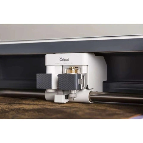Close-up of Knife Blade And Drive Housing For Makers Compatible With Cricut Maker Cutting Machine in use on thick material.