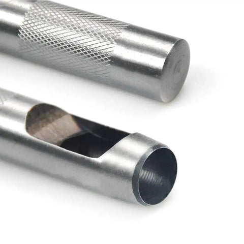 Close-up of 9 Piece Hollow Punch Set With Free Cutting Mat For Leatherwork, showing metal punch tools with textured handles.
