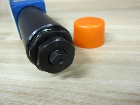 Close-up of ZDR 6 DB2-43/25YM sandwich plate pressure-reducing valve showing fitting end, nominal size 6, with orange cap.
