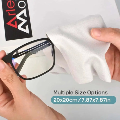 Person cleaning eyeglasses with Large Suede Microfiber Cleaning Cloths For Eyeglasses 12 Pack 20x20 Cm Lint Free, white cloth.