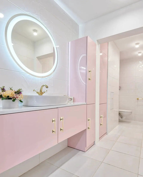 Modern bathroom with pink cabinets featuring 2 Pack 5 Inch Self Stick Cabinet Handles With Adhesive Gold Metal Drawer Pulls installed.