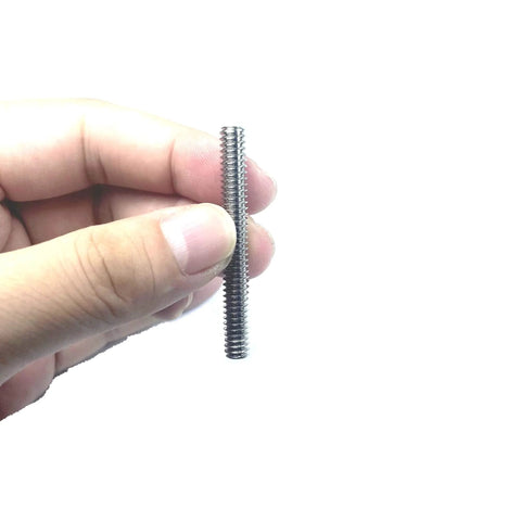 Hand holding Six Piece Set Screws One Quarter Twenty Inch Hex Socket Stainless Steel 304 With Allen Head for fastening