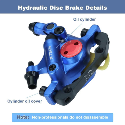 Blue XTECH hydraulic disc brake caliper with red oil cap and black mounting bracket.