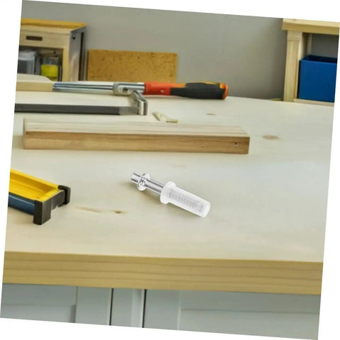 Workshop scene with a pivot hinge from the 8 Piece Bifold Closet Door Hardware Set With Precision Pivot Hinges From Tofficu on a table.