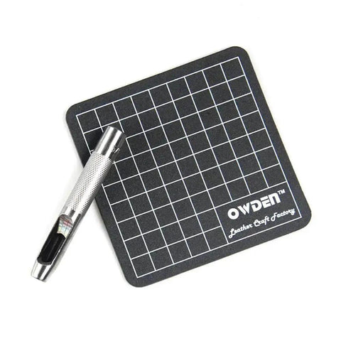 6 Piece Hollow Hole Punch Set With Free Cutting Mat for DIY leather, fabric, and craft projects, shown with tool on mat.