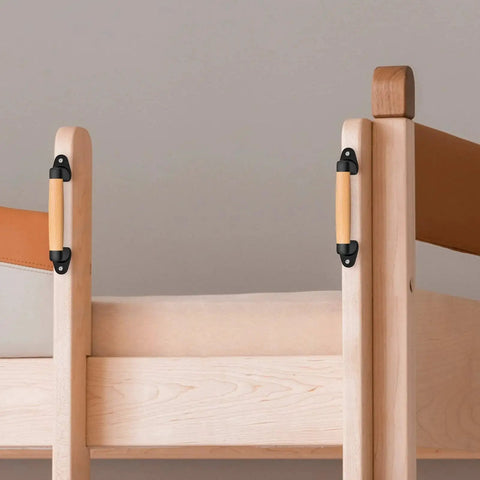 9 Inch Beech Wood Barn Door Pull Handle With Plastic Brackets installed on wood structure, showing smooth round edges for safe kids.