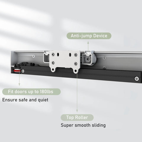 Close-up of the Concealed Barn Door Hardware Kit With Soft Close showing anti-jump device and top roller on aluminum track.