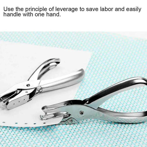 One Handed Hole Punch For Paper, 6 Sheet Capacity, 3.175mm Hole, Chrome Plated Handheld Puncher on paper, shown close-up
