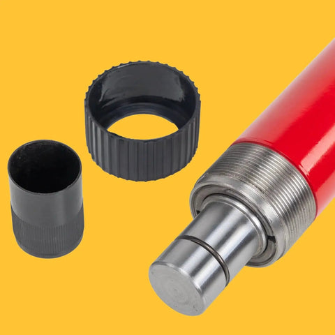 Close-up of 10 Ton Hydraulic Floor Jack Pump Portable Ram for auto body and frame repair with metal cylinder and black caps