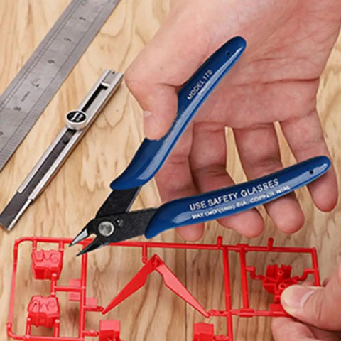 2 Pc Dark Blue Wire Cutter Set With Flush Cutters And Diagonal Pliers For Electronics Repair Jewelry Making DIY Projects, close-up of flush cutter in use.