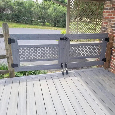 Heavy Duty Gate Caster With Built In Spring For Wooden Gates And Fences installed on grey wooden gate