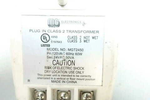 Label on MGT2450 Plug In Transformer 60W 120V AC To 24V AC Power Adapter showing specifications and safety warnings.