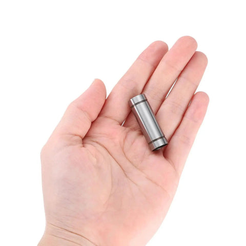 Person holding one 4Pcs LM6LUU Linear Bearing 6mm Bore 12mm OD 35mm Length Double Sided Rubber Sealed Ball Bearing