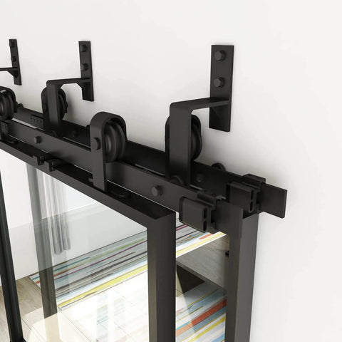 Close-up of the Double Bypass Glass Barn Door Kit With 10 Ft Hardware And Soft Close, showing black carbon steel frame and clear glass.
