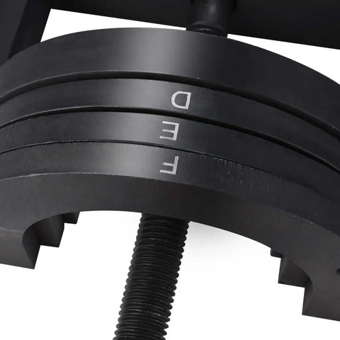 Close-up of the Ultimate Wheel Hub Removal Tool Set with C to U sizes, showing labeled metal rings D, E, F for DIY car maintenance.