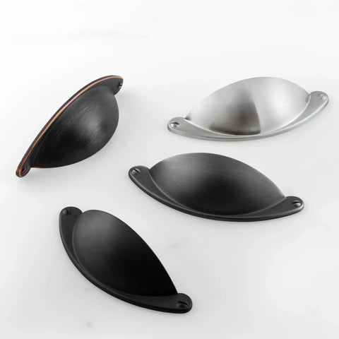 Various styles of 2.5 inch cup pulls, including oil rubbed bronze drawer pulls, shown in different finishes and angles.