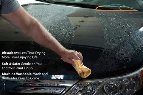 Hand using Large 27x17 Inch Drying Chamois Cloth For Cars Super Absorbent Washable on car hood