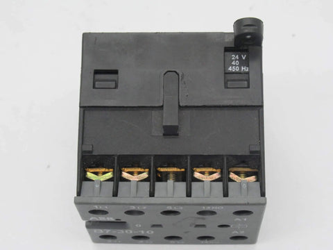 Front view of Miniature 3-pole contactor B7-30-10-01 with 24V coil, showing terminals, compact industrial relay for three-phase switching.