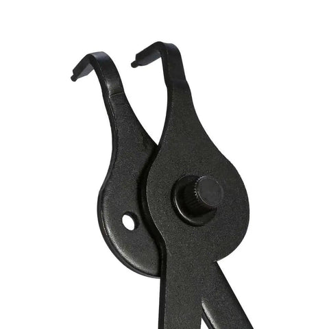Close-up of Heavy Duty Snap Ring Pliers Set 11 Piece For Internal And External Circlip Rings Retaining Ring Removal Tools For Autos Pro Grade Lawn Mowers Farm Equipment Built Tough Heat Treated Steel Reversible Tips For Easy Use, highlighting reversible tips.