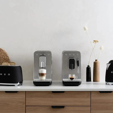 Fully Automatic Coffee Maker With Steam In Black Brings Home Barista Vibe With Six Drink Options From Ristretto To Large Coffee Plus Extra Strong Brews And Hot Water With A Stainless Steel Burr Grinder For Fresh Flavor on a countertop