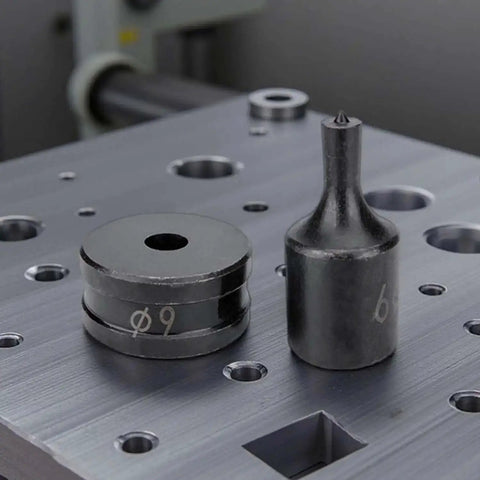 Hydraulic Round Hole Punch Die Set For Steel Copper And Aluminum, showing dies on metal surface for CH-70 machine