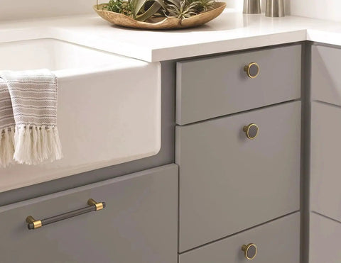 Mergence Cabinet Pull in Matte Black Champagne Bronze, Five And One Sixteenth Inch Center To Center, installed on kitchen drawer