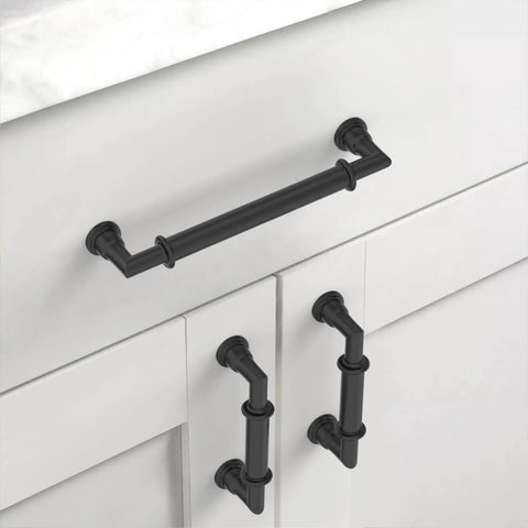 Matte Black 5 Inch Cabinet Handles Set 10 Pack Heavy Duty Solid Metal Kitchen Cabinet Pulls for cupboards and drawers installed on white cabinet.