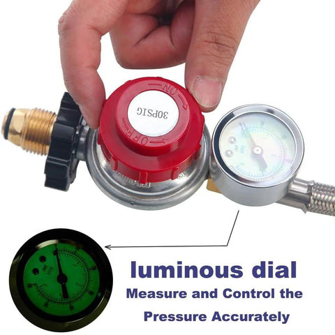 Propane regulator with gauge and red adjustment dial connected to a stainless steel braided hose