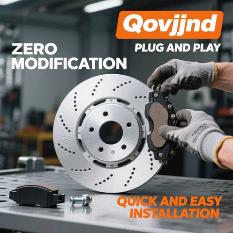 Mechanic installing brake pad on perforated rotor in an auto shop with tools on metal workbench