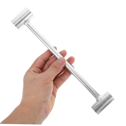 Hand holding Door Hinge Adjustment Tool Pro Grade Heavy Duty Wrench for Precision Alignment and Hinge Repair by MagicLulu, stainless steel.