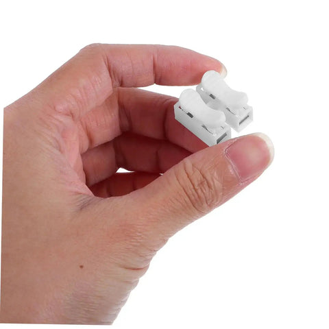 Hand holding 80Pcs Spring Clamp Terminal Connectors For LED Lighting Quick Connection Barrier Blocks Electrical Wiring Terminal Blocks