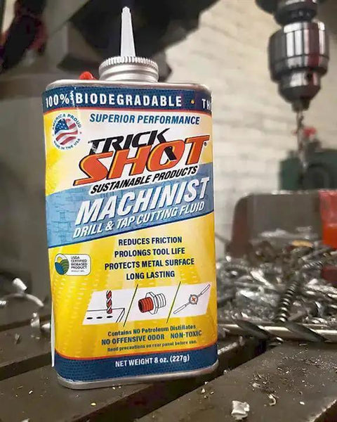 Machinist Drill And Tap Cutting Fluid With A Bio Based Formula That Slashes Friction And Extends Tool Life On Steel Aluminum Copper And More Made In The USA NSF H1 Food Grade Safe For Metalworking Tools 8 Oz. bottle in workshop setting