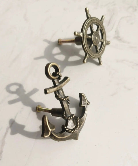 Antique Bronze Cabinet Knobs And Drawer Pulls Set with Anchor and Rudder Nautical Theme Matte Bronze finish on white background