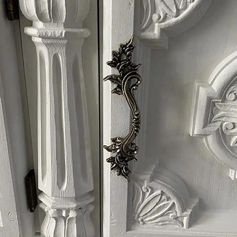 Side view of Five Piece Antique Bronze Drawer Handle Set 6.61 Inch Vintage Cabinet Pulls on white decorative furniture